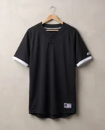 Russell Baseline Covered Placket Baseball Jersey in Black and White, hanging styling view