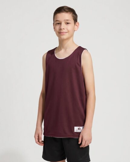 Youth B Core Reversbile Basketball Jersey worn by a model