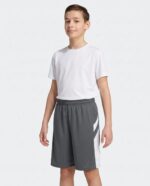 Youth B Pivot Reversible Basketball Shorts worn by a model