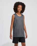 Youth C2 Mesh Reversible Basketball Jersey worn by a model