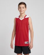 Youth Cross Over Reversible Basketball Jersey worn by a model
