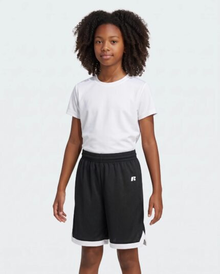 Youth Elite Basketball Shorts Powered By Coolcore worn by a model